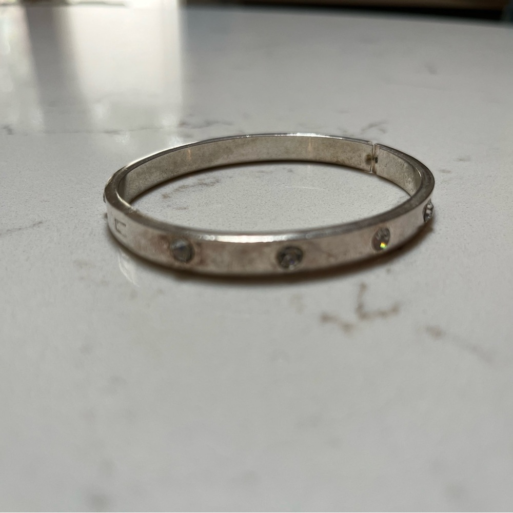 Silver tone Bracelet with diamond like accent